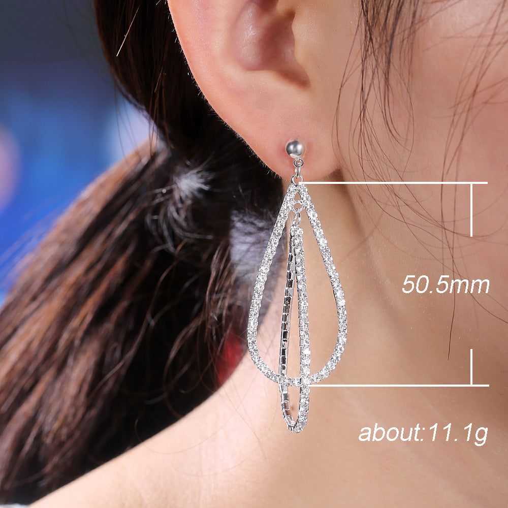 Courbe - Teardrop Shaped Chain Tassel Earrings